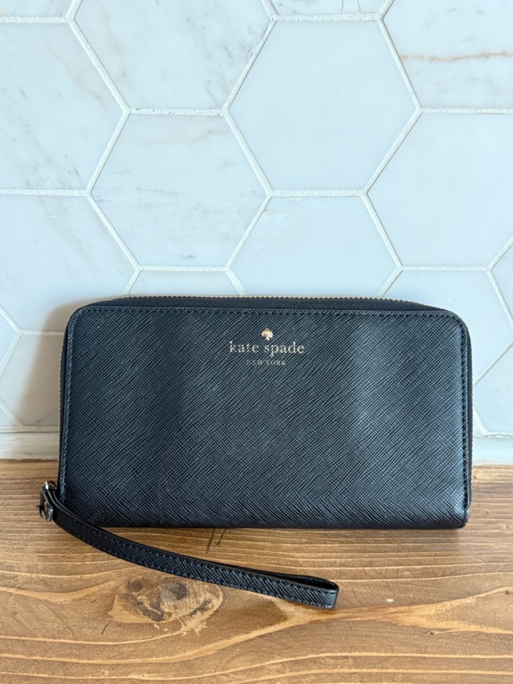 kate spade black zip-around Saffiano wallet with gold logo